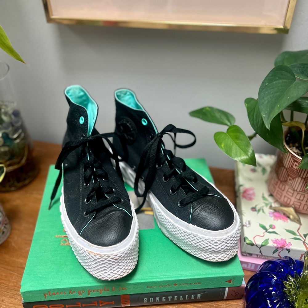 Converse Black High-Top Sneakers with White Soles and Leather Details